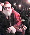 Santa scurries off to an Avenue A bar.